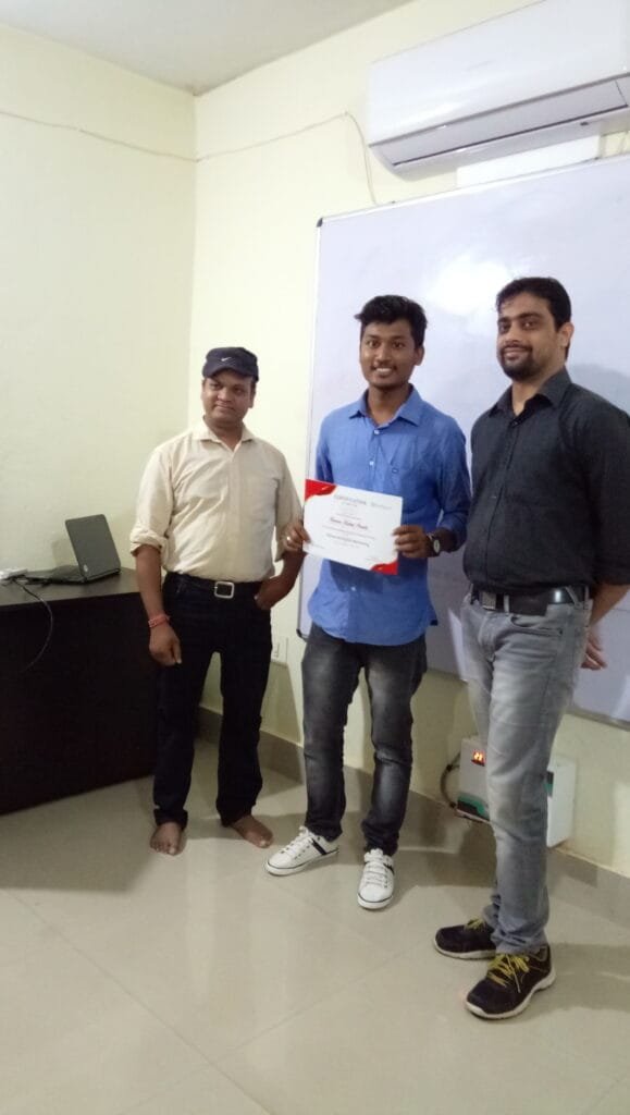 Rahul receiving his training completion certificate from Umashankar sir.